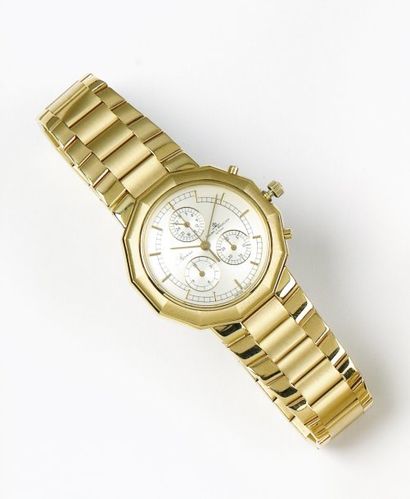 BAUME ET MERCIER «RIVIERA» Bracelet montre chronographe en or jaune. Cadran ivoire...