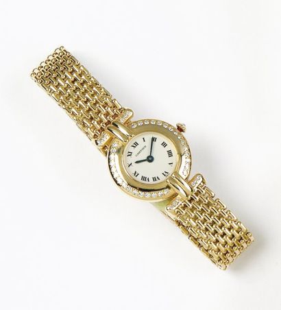 CARTIER «COLISEE» Bracelet montre de dame en or jaune. Cadran ivoire à chiffres romains....