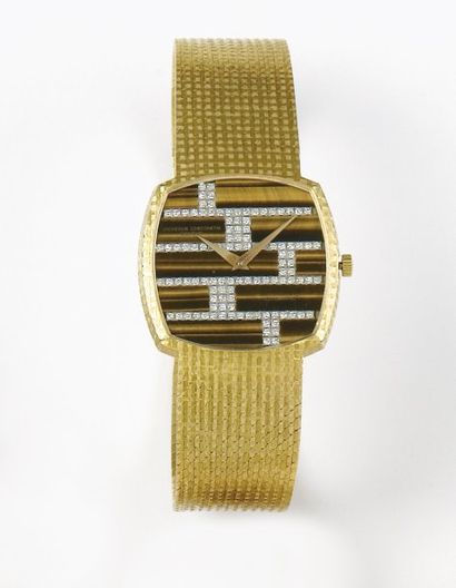VACHERON CONSTANTIN Bracelet montre en or jaune. Cadran oeil de tigre et diamants....