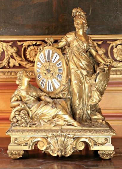 null IMPORTANTE PENDULE en bronze ciselé et doré, à décor de vestales à l'effigie...