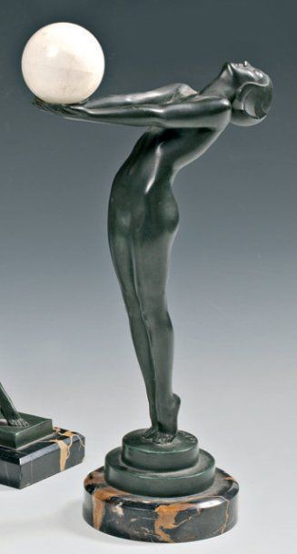 MAX LE VERRIER (1891-1973) SCULPTURE en bronze patiné et albâtre, à décors de femme...