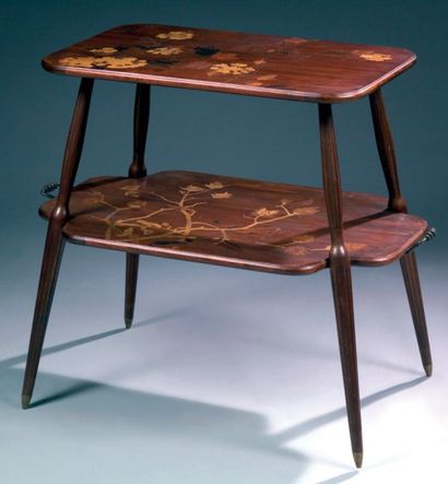 MAJORELLE Louis (1859-1926). Table à thé à deux plateaux rectangulaires sur piétement...