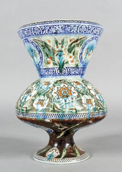null Théodore DECK. Vase en céramique polychrome à décor et forme inspirés de l'Art...