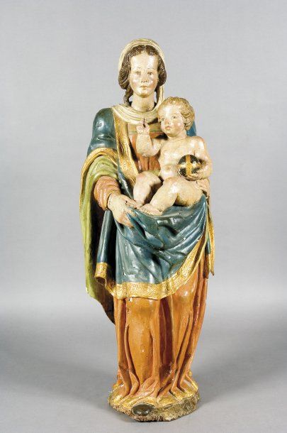 null Vierge à l'enfant en bois sculpté peint en polychromie. XVIIIème siècle. (Repeints)....