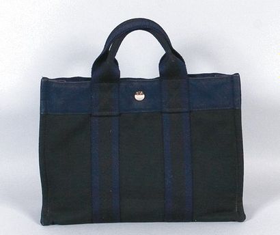 HERMÈS Paris made in France Mini Sac "Toto bag" 30cm en toile noire, sangles bicolores...