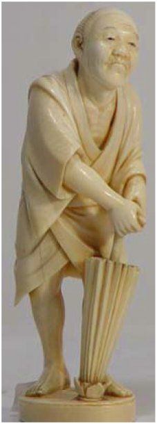 null Okimono en ivoire sculpté d'un seul tenant représentant un paysan japonais,...