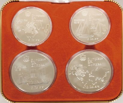 JEUX OLYMPIQUES Etui contenant 4 pièces d'argent commémoratives des Jeux Olympiques...