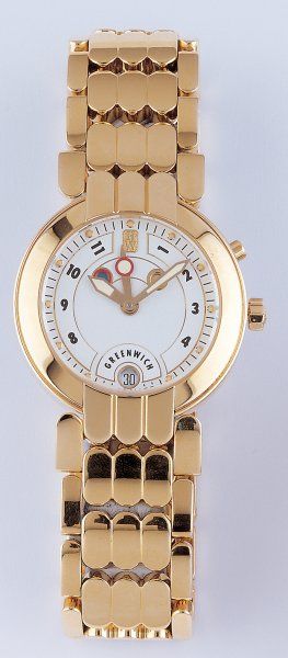 HARRY WINSTON GREENWICH. BRACELET-MONTRE en or jaune. Cadran blanc. Date. Deuxième...