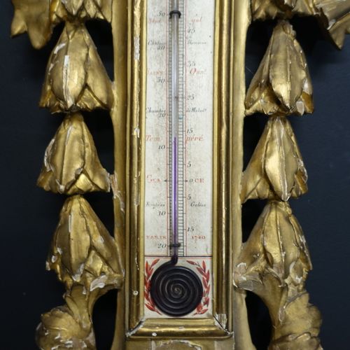 Baromètre d'époque Louis XVI en bois doré sculpté d'un ruban noué et chutes de f&hellip;