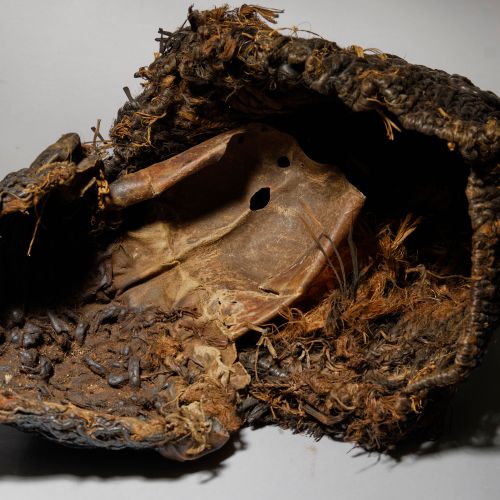 Igbo Mask Nigeria 
Leather and vegetal fibers 37 cm 
Provenance: 
Helen and Mace&hellip;