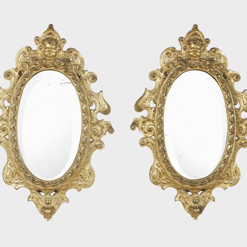 Null Paire de miroirs, circa 1900

Bronze doré, 50x32 cm
