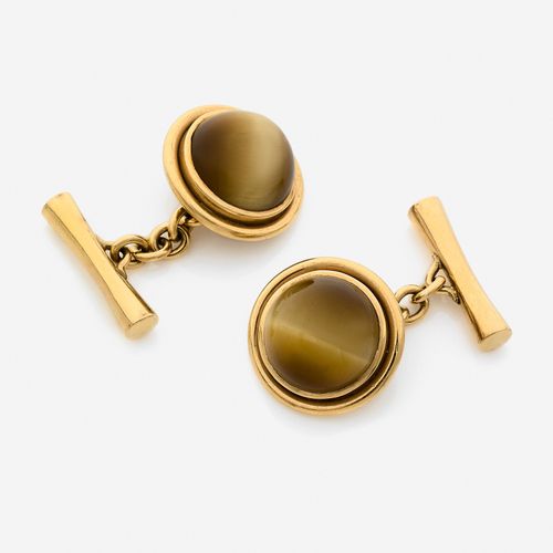 Null CARTIER 
Paire de boutons de manchettes
En or jaune 18k, ornés chacun d'un &hellip;