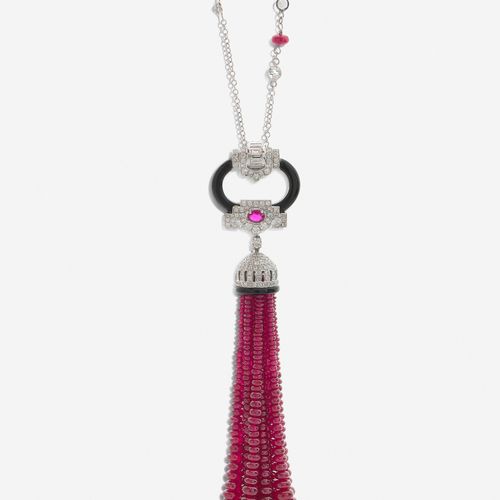 Null 
Pendentif et sautoir
En or gris 18k, fait d'un pompon formé d'une chute de&hellip;