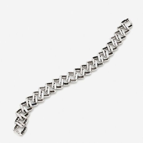 Null 
Bracelet souple
En or gris 18k, les maillons carrés sertis de diamants ron&hellip;