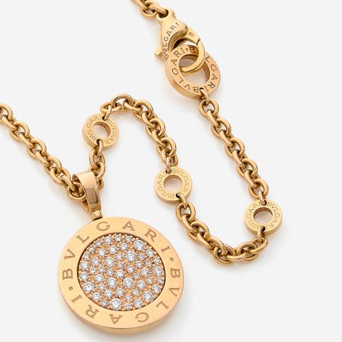 Null BULGARI 
Collier
En or jaune 18k, maille ronde retenant un pendentif sphéri&hellip;