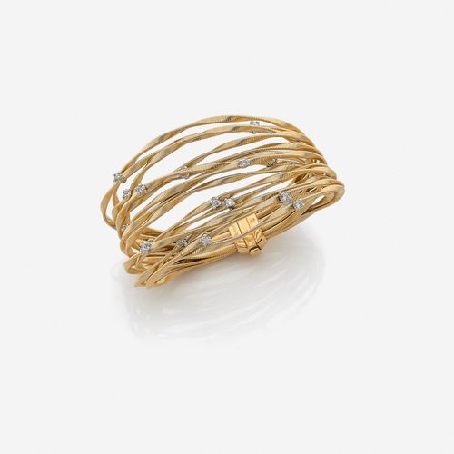 Null Marco BICEGO 
Bracelet
En or jaune 18k à quinze brins souples guillochés et&hellip;