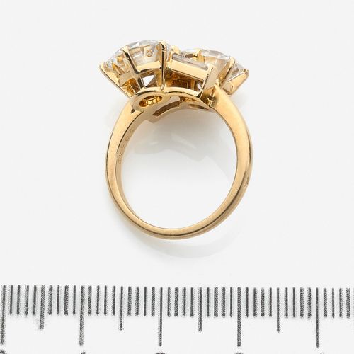 Null MELLERIO dits MELLER 
Bague "Toi et Moi"
En or jaune 18k, formée de deux di&hellip;