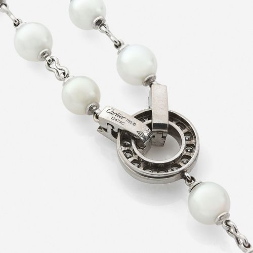 Null CARTIER 
Sautoir-chapelet
En or gris 18k, formé de perles de culture parsem&hellip;