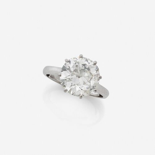 Null 
Solitaire
En platine et or gris 18k, orné d'un diamant demi-taille

Poids &hellip;