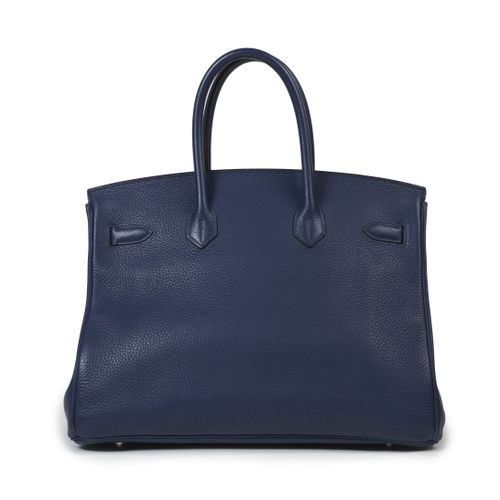 Null HERMÈS
2015
Sac BIRKIN 35
Taurillon Clémence Bleu Saphir
Garniture métal ar&hellip;