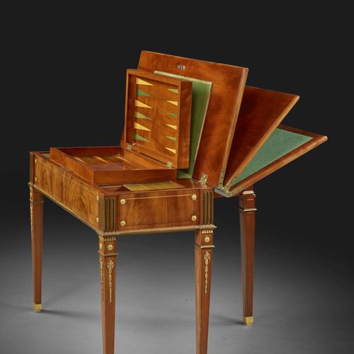 Null LOUIS XVI ERA MECHANICAL GAME TABLE By David Roentgen, circa 1780
In mahoga&hellip;