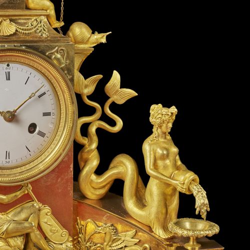 Null 帝国时期的时钟 
铜制双色凿刻和鎏金，表盘上刻有海王星向贝壳盆洒水的图样，上面有两个用链子牵着蜗牛的普提，侧面有尼瑞德的图案；机芯据说有

H.45厘&hellip;