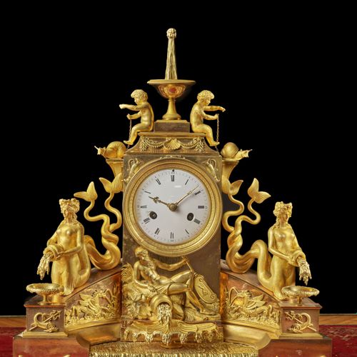 Null CLOCK OF THE EMPIRE PERIOD 
In chased and gilded bronze with two tones, the&hellip;