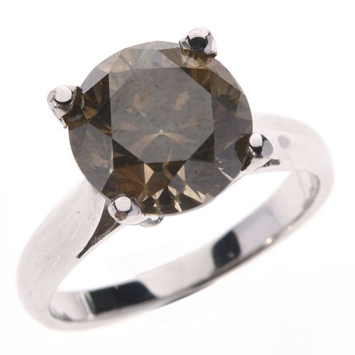 BAGUE "solitaire" en or gris 750/°° sertie d'un diamant taillé en brillant de 4.&hellip;