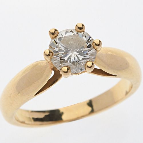 BAGUE "Solitaire" en or jaune 750/°° sertie d'un diamant de taille brillant de 0&hellip;