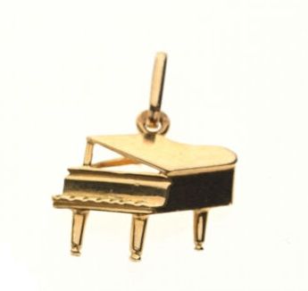 PENDENTIF "Piano" en or jaune 750/°°. 1.2 x 1.1 cm. Poids: 0.8 g.