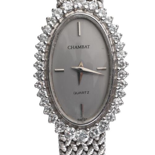 CHAMBAT - BRACELET MONTRE de dame en or gris 750/°°, le boîtier ovale, lunette d&hellip;