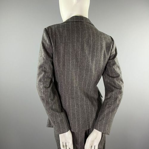 Null JIL SANDER - Wool trouser suit - Size 36 - 1990s

The ensemble is cut in a &hellip;