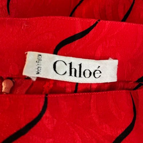 Null CHLOÉ - Jupe en soie rouge - Taille S

Le modèle est taillé en soie rouge f&hellip;