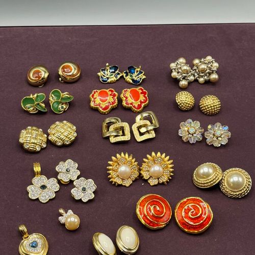 Null Set of costume jewelry including

13 clip earrings, including a CARVEN mode&hellip;