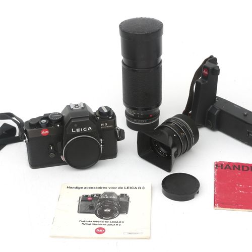 Null Una fotocamera reflex elettronica Leica R3 (con manuale originale) e due ob&hellip;