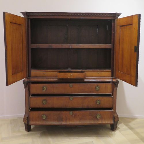 Null A mahogany Louis-Seize cabinet decorated with gilt fittings, garlands, and &hellip;
