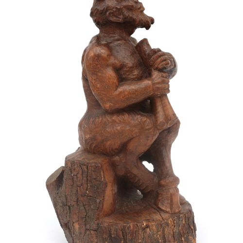 Null A solid carved wooden sculpture of Pan, signed Eugenio in the base. Height &hellip;