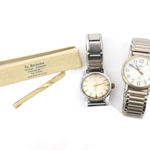 Null Two wristwatches and a gold-plated tie pin.