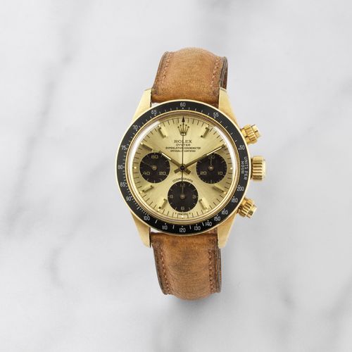 Rolex. Beau et rare chronographe bracelet en or jaune 18K (750) mouvement mécani&hellip;