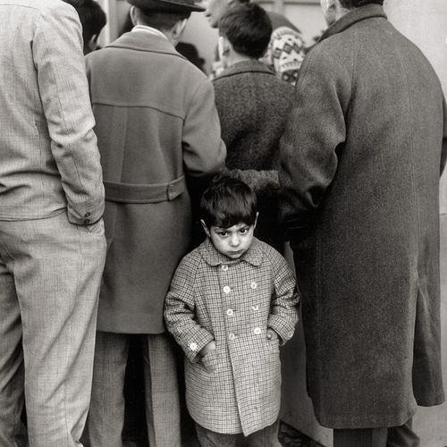 Cattanao, Mario Boy in crowd. 1964. Vintage ferrotyped gelatin silver print on d&hellip;
