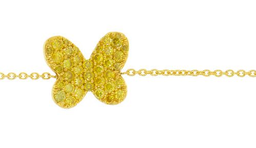 Null Bracelet or 750 à maille forçat retenant un papillon pavé de diamants jaune&hellip;