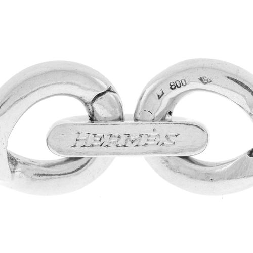 Null Hermès, bracelet souple argent torsadé, signé, long. 17 cm