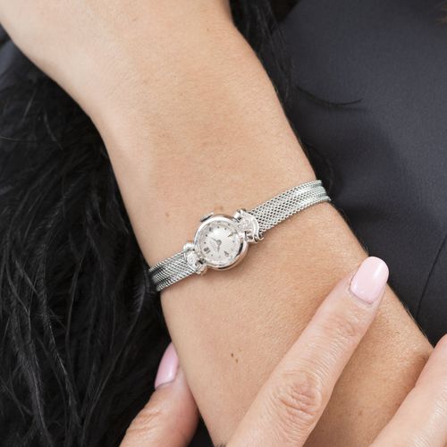 Null Universal, montre-bracelet en or gris 750 sertie de diamantsMouvement: cal.&hellip;