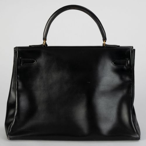 Null Hermès, sac Kelly 35 retourne en cuir Box noir, année 1972, bouclerie plaqu&hellip;