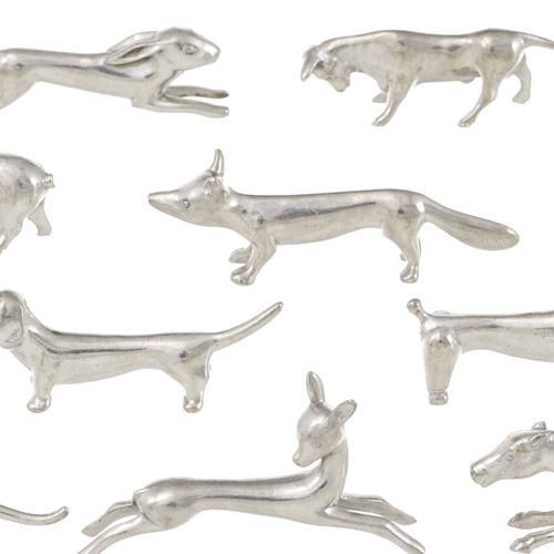 Null Suite de 12 porte-couteaux animaux en étain, Suisse, XXe. Long. Env. 9 cm