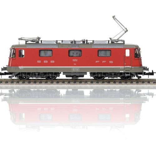 Null TRIX (Allemagne), échelle HO, lot de 3 locomotives CFF/SBB/FFS, comprenant &hellip;