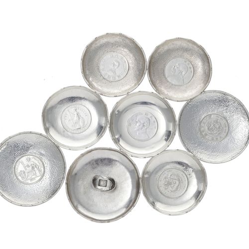 Null A collection of 8 silver saucers, China, 20th century, each one with a coin&hellip;