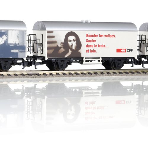 Null Märklin（德国），HO比例，瑞士货运车，一套23辆，包括。- 1套瑞士巧克力套装（6节车厢）- 2套SBB广告套装（2 x 4节车厢）- 2套货&hellip;