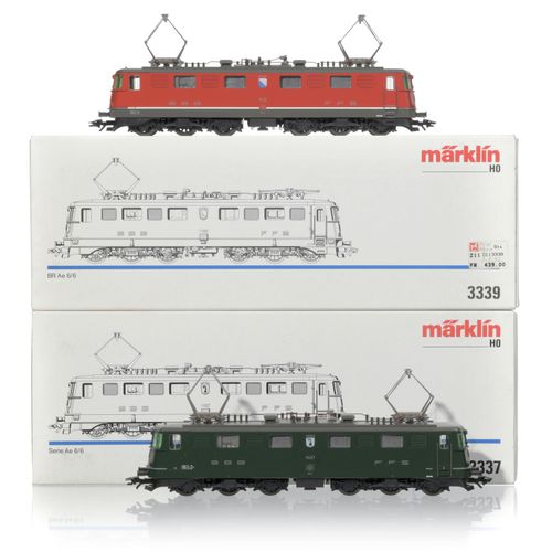 Null Märklin（德国），HO比例，2台BR Ae 6/6 SBB/FFS机车，一台绿色表面和巴塞尔市徽，另一台红色表面和苏黎世市徽，交流电

像新的一&hellip;