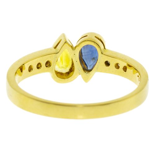 Null Ring aus 750er Gold, besetzt mit einem Saphir und einem gelben Saphir im Tr&hellip;